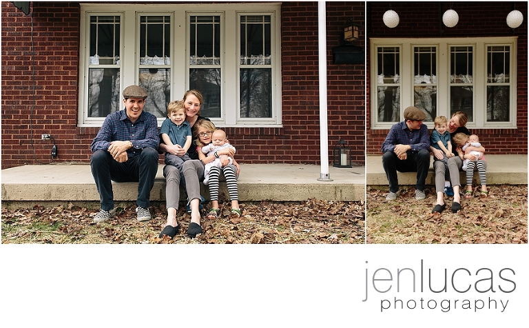 Family of five sits on front porch together. 