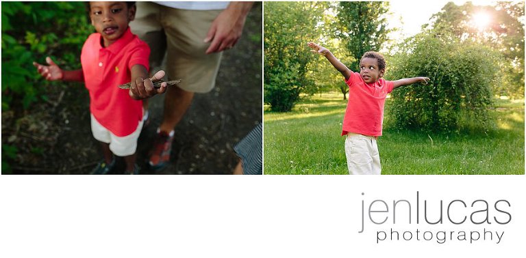 Boy finds small piece of wood and pretends it is a surfboard. He holds out his arms and pretends to surf in the middle of the Arboretum. 
