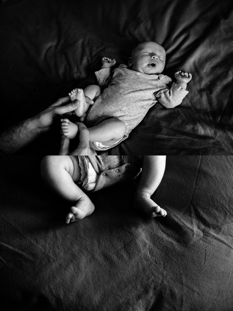 Black and white. Newborn baby sleeps on a blanket.