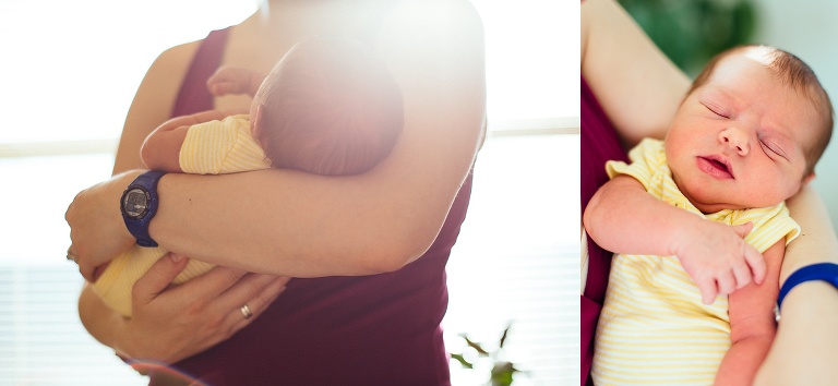 Mother holds sleeping newborn baby in her arms.