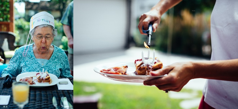 Family puts birthday candles on their mothers brunch for her 90th birthday.