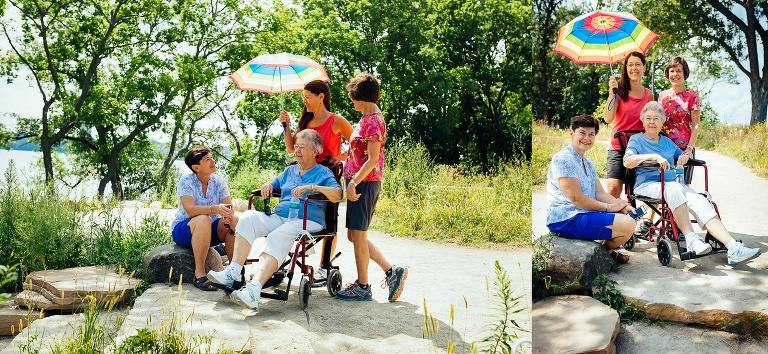 Three sisters push their 90 year old mother down a lakeshore path for her birthday celebration.
