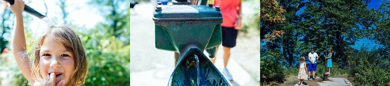 Family outside on a walk, kids play with a old water pump.