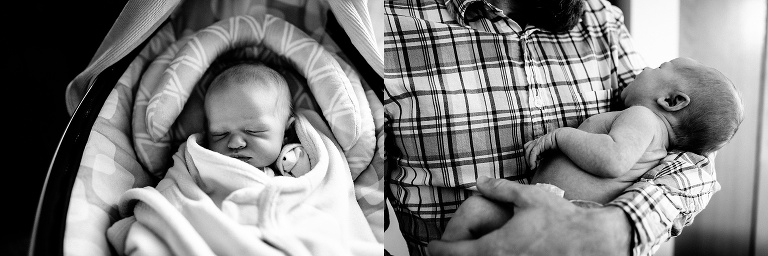 Black and white. Father holds sleeping newborn baby.