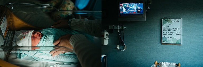 Mother picks newborn baby from bassinet in the hospital, news playing on the tv in the background.