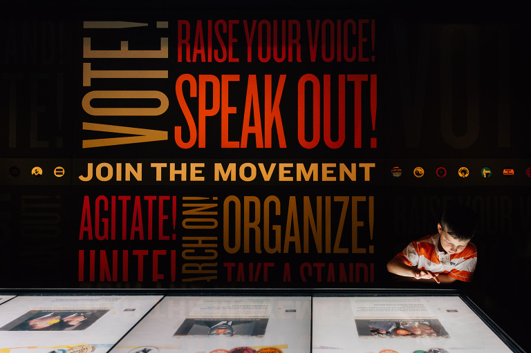 Boy explores touch screen at National Civil Rights Museum 
