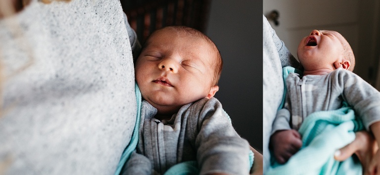 Mother holds newborn baby.