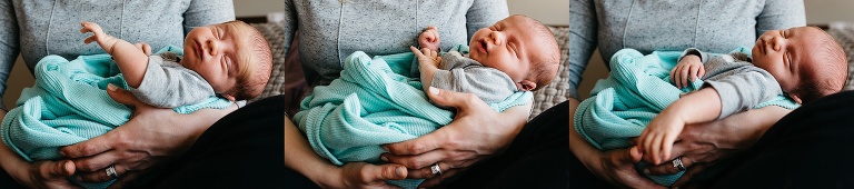 Mother holds sleeping newborn baby.