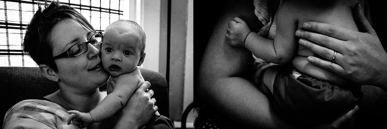 Black and white. Mother holds and cuddles her baby boy. her hand resting on his bare back
