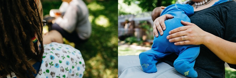 Mother holding sleeping baby boy. Camera angle of mothers hands supporting him and his little feet resting.