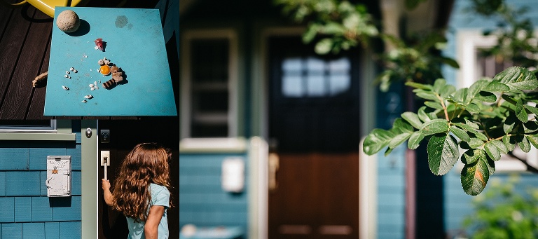 Young girls opens the door to go inside her blue house.