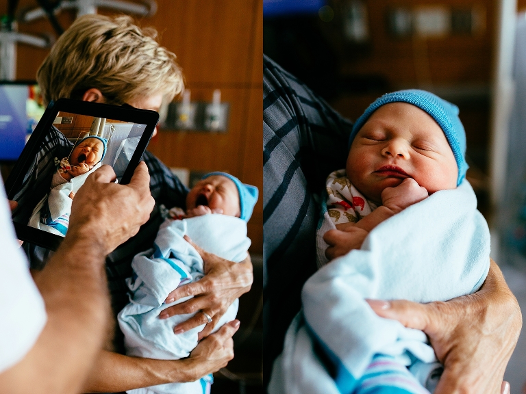 Grandparents use an iPad to take pictures of newborn grandson at hospital