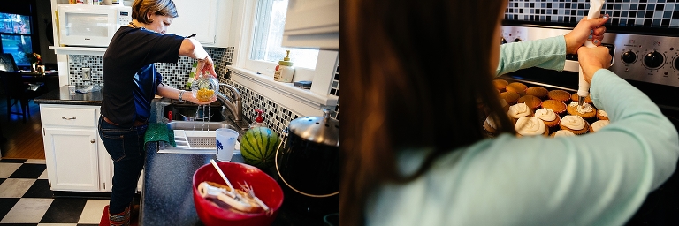 Mother rinses ground cherries in sink while daughter frosts cupcakes