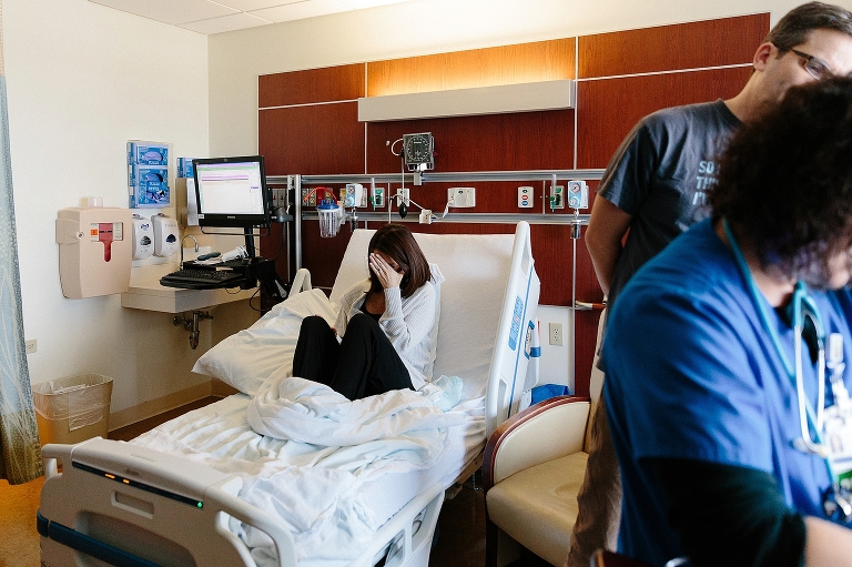 Mother cry's in hospital bed