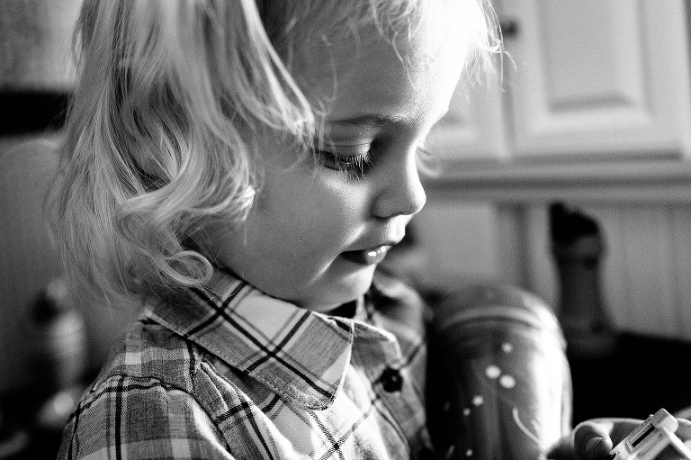 Black and white closeup of little girls face