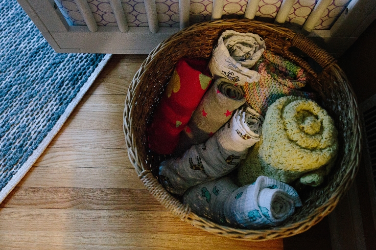Basket of rolled up blankets 