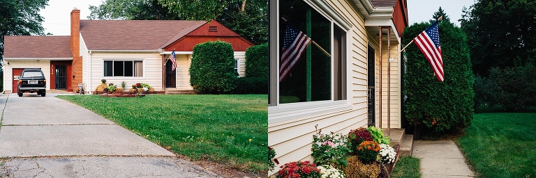 Small one story red and yellow house with american flag and car parked in driveway.