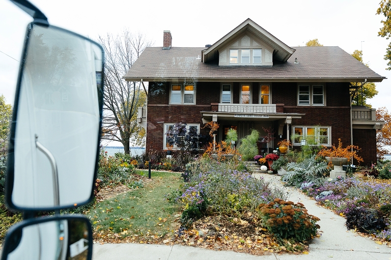 Looking out bus window at wedding venue
