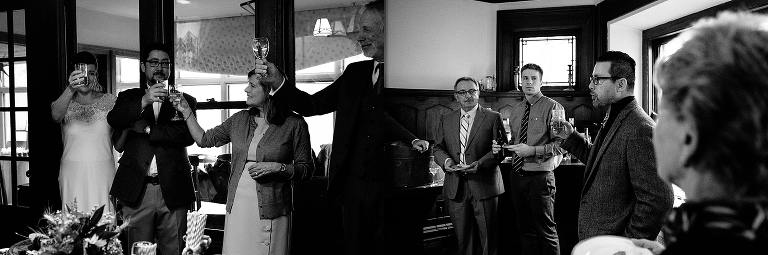 Family toasts for the newly weds at wedding after party