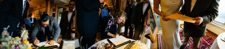 Family signs cards for the bride and groom at wedding