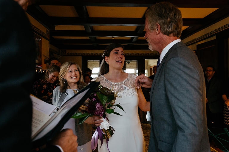 Father hands off daughter at her wedding