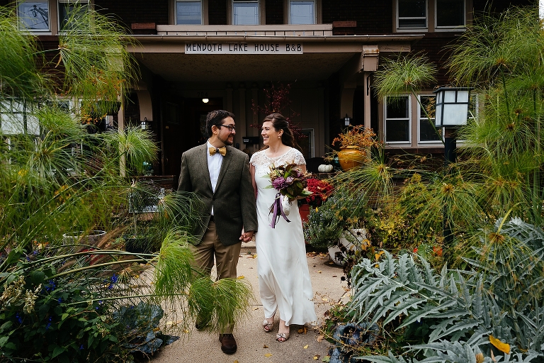 Bride and groom walk together on their wedding day