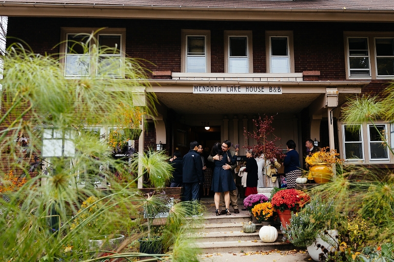 Family greets each other outside wedding venue