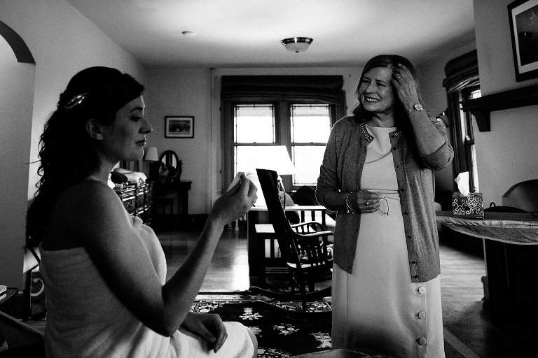 Black and white. Mother and bride sit together on wedding day
