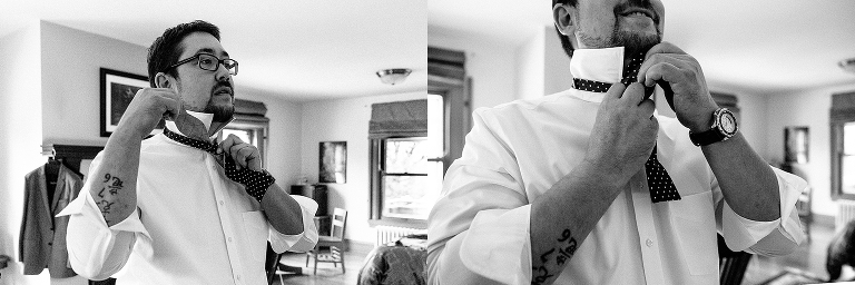 Black and white. Groom ties his bow tie for wedding