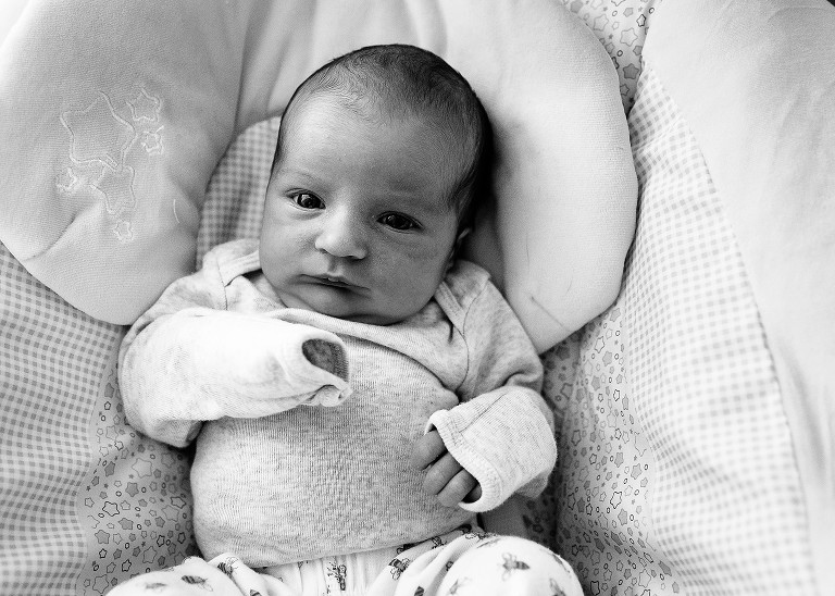 Black and white. Portrait of newborn girl. 