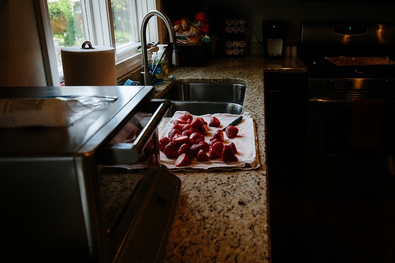 Strawberries on the counter. 