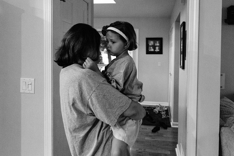 Mom comforts daughter who is anxious about the first day of school 