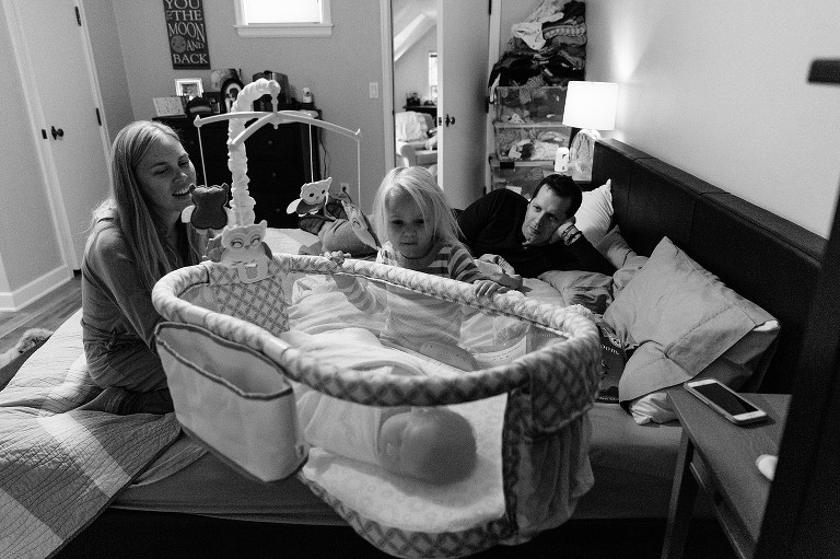 Family of four in bed 