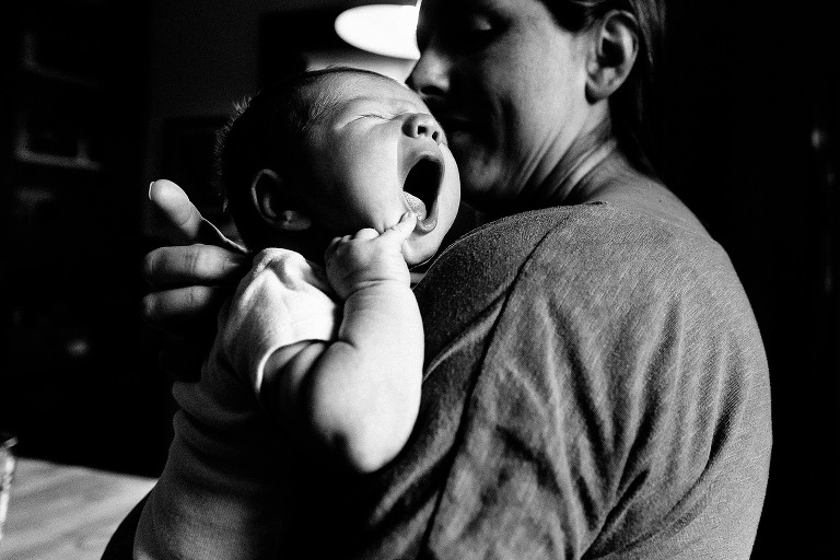 Black and white. Newborn yawns.