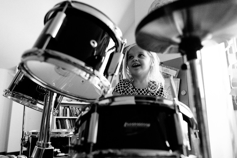 Girl plays drums