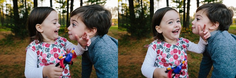 Twins play with each other 