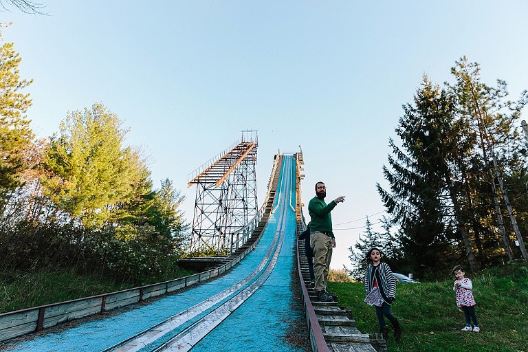 The family checks out a ski ump 