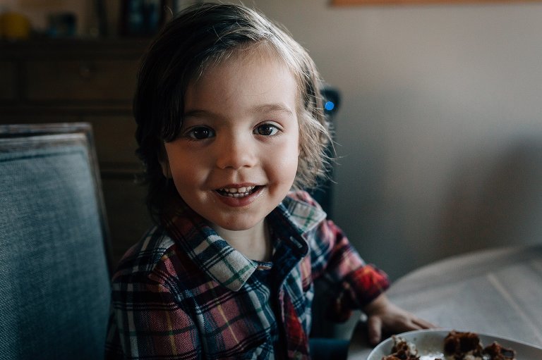 young boy at kitchen table 
