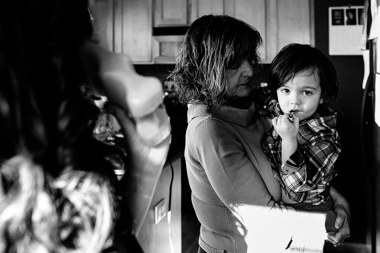 grandmother holding young boy 