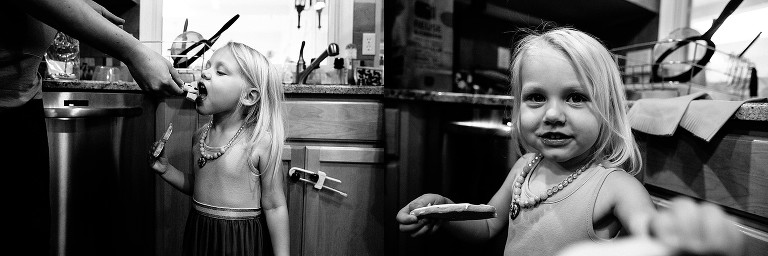 Black and white. Sharing a cookie in the kitchen 