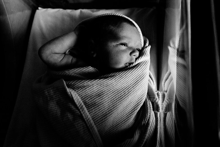 Alert baby in basinet 