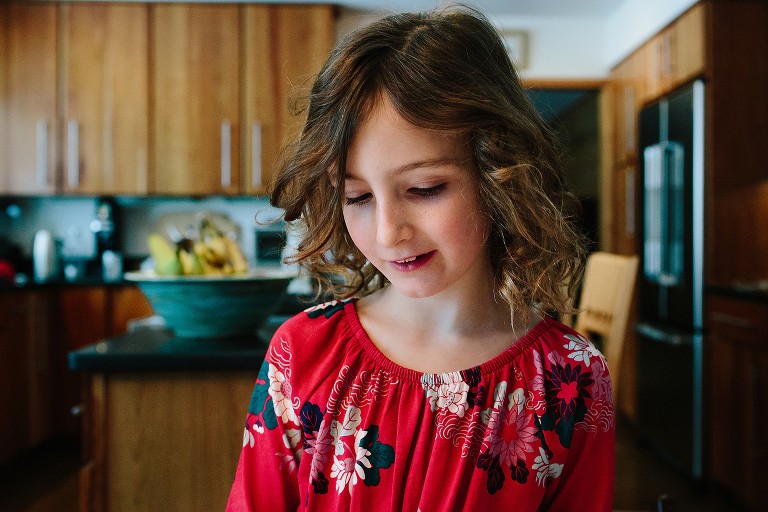 Portrait of a girl in her kitchen 