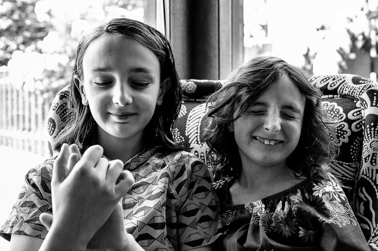 Portrait of boy and girl siblings, not camera aware