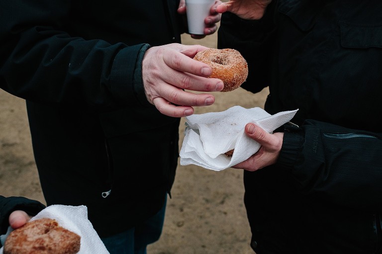 Dad takes donut from mom 
