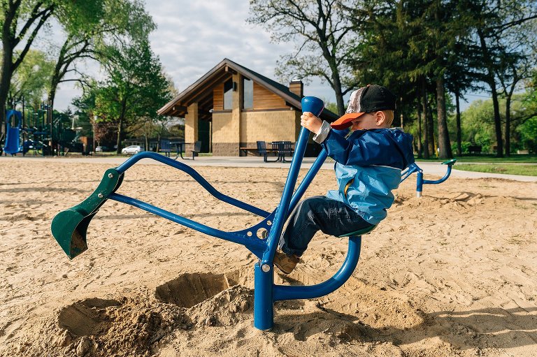 Preschooler digs at beach