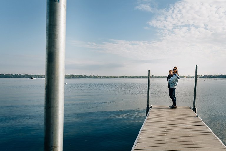 Mom and toddler on pier 