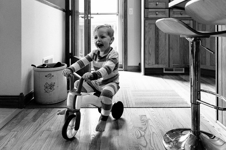 Preschooler rides balance bike