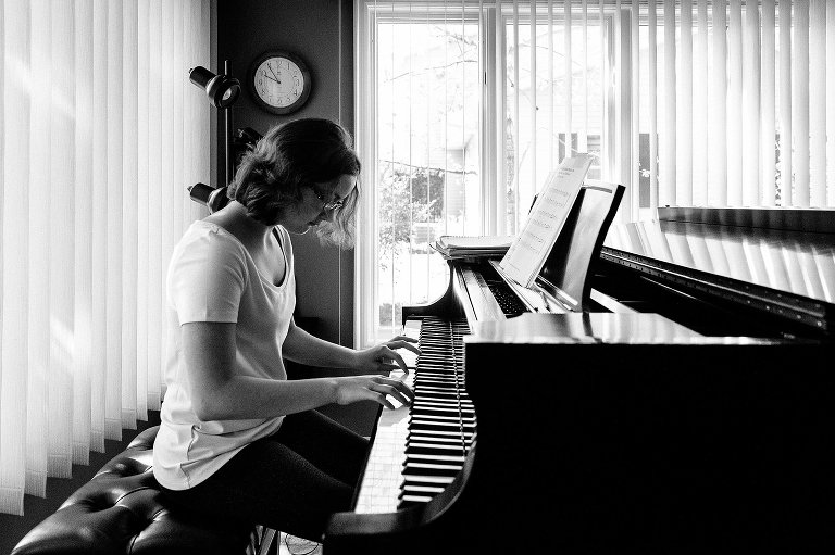 Teen girl plays the piano 