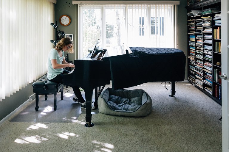 Teen girl plays the piano 