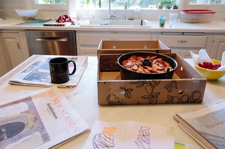 Preparing cake for transport to brunch party